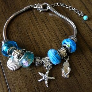 Beautiful Blue Charm Bracelet w/Ornament Pendants